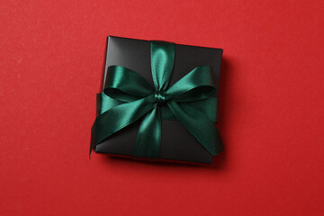 gift box with bow on red background