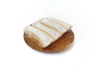 Pancong or Bandros cake is an Indonesian traditional snack made from a mixture of rice flour, grated coconut, and coconut milk.