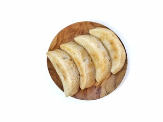 Pancong or Bandros cake is an Indonesian traditional snack made from a mixture of rice flour, grated coconut, and coconut milk.