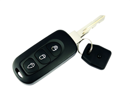Car key fob with metal key isolated on a transparent background