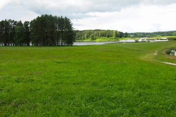 picturesque Russian summer expanses: fields, lakes, forest in Pushkin's Mikhailovskoye estate