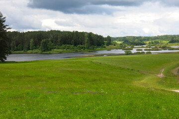 picturesque Russian summer expanses: fields, lakes, forest in Pushkin's Mikhailovskoye estate