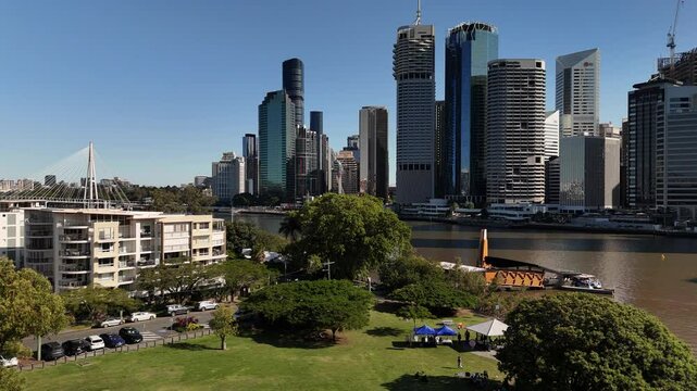 Captain Burke Park, Brisbane CBD, Queensland, Australia: 4K Aerial Drone Footage of Modern City Skyline, Skyscrapers, Brisbane River, Bridges, Urban Infrastructure, Waterfront and Parklands