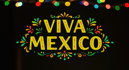 Viva Mexico colorful text with decorative elements on black background. Mexican celebration concept. Traditional fiesta party decorations, festive atmosphere. Cinco de Mayo, Independence Day events