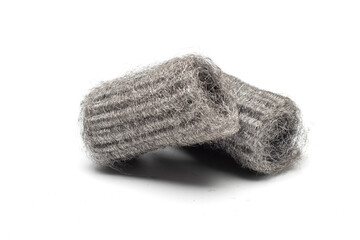 Steel wool, also known as iron wool or wire sponge. commonly used as an abrasive for cleaning, polishing, and surface preparation. isolated in white background.
