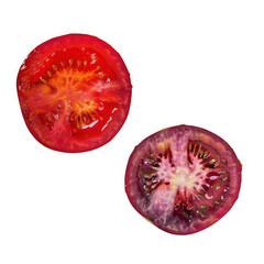 Two halved tomatoes isolated on transparent background red and purple