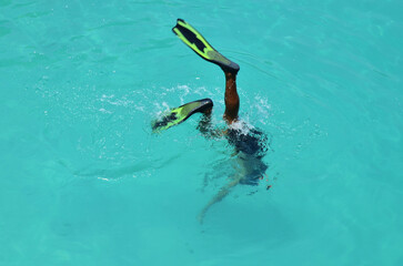 Thai people and foreign travelers travel visit swimming and snorkeling scuba diving see coral and...