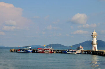 Ferry boat ship stop wait thai people and foreign travelers and vehicle crossing sea ocean Gulf of...