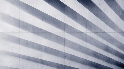 Abstract geometric patterns of shadows cast on a concrete wall creating visual depth and intrigue