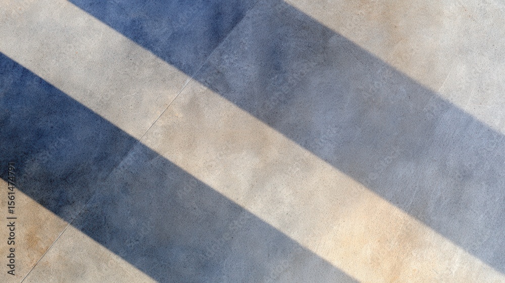 Poster abstract patterns of light and shadow on a textured surface, creating a serene atmosphere