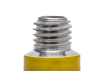 Close up shot of thread on metal tube and it's seal. sealed metal tube. 