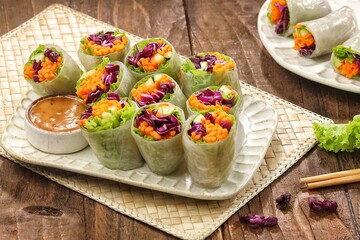 Vietnam Spring Roll. Vietnamese spring rolls, summer spring rolls, or salad spring rolls, a traditional dish in Vietnamese cuisine consisting of pork, shrimp, vegetables, bún, and other ingredients wr