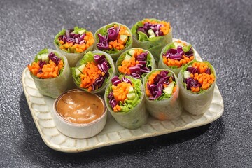 Vietnam Spring Roll. Vietnamese spring rolls, summer spring rolls, or salad spring rolls, a traditional dish in Vietnamese cuisine consisting of pork, shrimp, vegetables, bún, and other ingredients wr