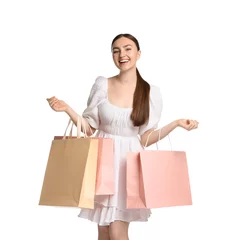 Fotobehang Positive woman with shopping bags on white background © New Africa