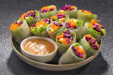 Vietnam Spring Roll. Vietnamese spring rolls, summer spring rolls, or salad spring rolls, a traditional dish in Vietnamese cuisine consisting of pork, shrimp, vegetables, bún, and other ingredients wr