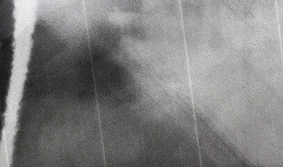 Obraz premium Old film texture with scratches, noise and glitch shapes. Realistic overlay film texture in black-white, dust and grain. Distressed retro movie or photo negative effect of cinema nostalgia. Artwork