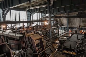 Big and old metal machinery in a coal mine, spooky, Zollverein Coal Mine Industrial Complex, Essen,...
