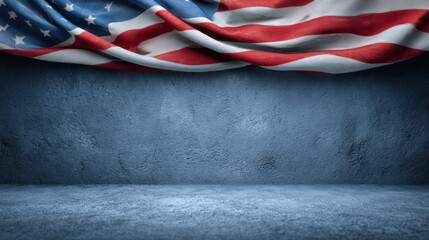 American flag fabric draped over concrete wall background with textured surface.
