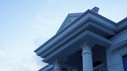 Classical Architecture of Elegant White Building with Corinthian Columns and Pediment