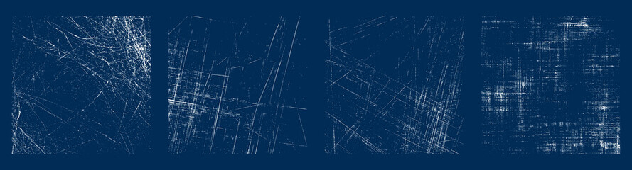 Scratched grunge texture overlays on deep blue background. Abstract distressed white linear texture set.