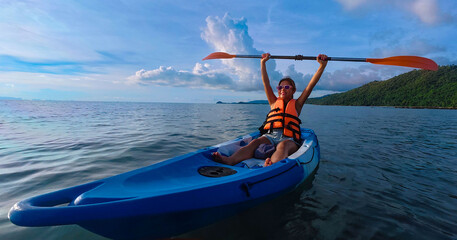 Happy holiday with asian woman traveller exploring calm tropical bay ,Travel and Active Lifestyle concept
