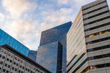 Modern office building in Seattle, United states, at sunrise, blue and grey colored windows
