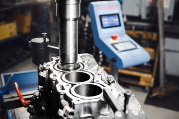 Service Boring under the piston after engine sleeve using machine with Computer Numerical Control....