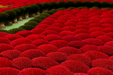 Obraz premium Traditional vietnamese incense sticks production in craft village