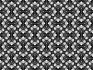 Flower geometric pattern. Seamless vector background. White and black ornament.