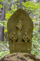 Carved stone on Higashiyama Walking Course in Takayama, Japan