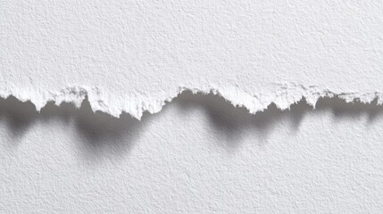 Textured White Paper with Torn Edge and Shadow Close-Up for Design Use.