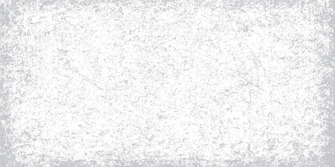 White, rough, and blank paper texture with a grunge pattern on a gray surface