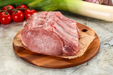 Raw pork loin cut with bone