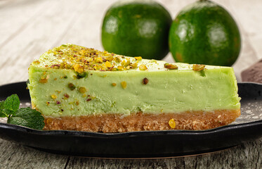 Green pistachio cheesecake served mint