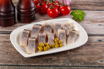 Slided marinated salted herring fillet