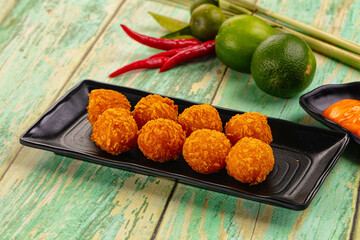 Fried crispy yellow cheese balls