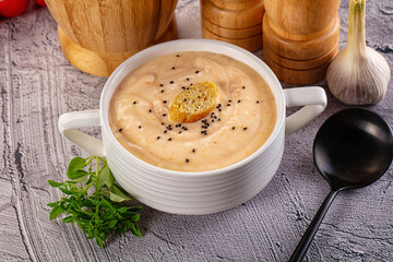 Tasty cheese cream soup with crouton
