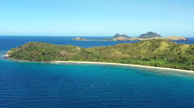 Aerial panning at Tokoriki island in Fiji pacific coral reef paradise as 4k.
