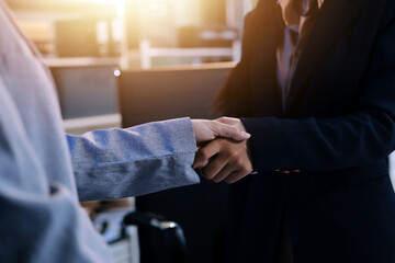 Business handshake for teamwork of business merger and acquisition,successful negotiate,hand...