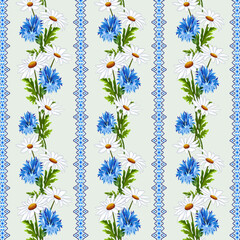 Chamomile and cornflowers in a pattern.Cornflowers and daisies in a vector seamless pattern on a light background with an openwork pattern.