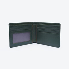 Genuine leather fashionable black wallet for men's isolated on a white background. A professional and stylish look. top view of black leather wallet. banknotes and put card inside the wallet