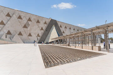 Grand egyptian museum exhibiting modern architecture and cultural heritage