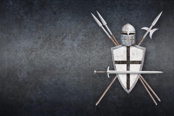 knight's sword helmet shield two spears and halberd on grunge background