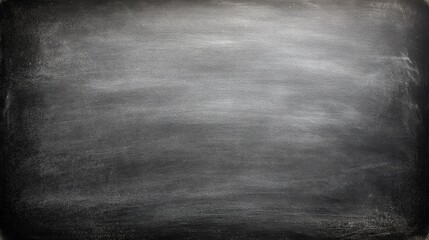 Fototapeta na wymiar Empty blackboard with chalk smudges and textured surface for education or presentation use.