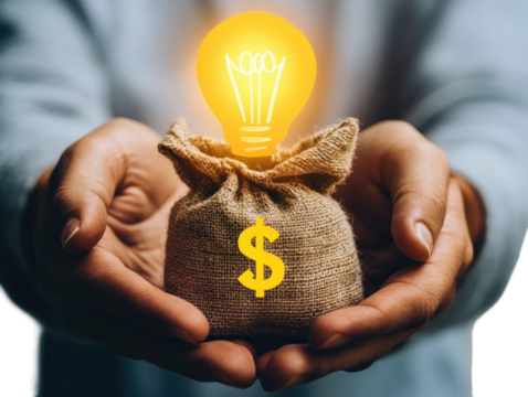 Hands holding a money bag with a glowing lightbulb above, symbolizing financial innovation