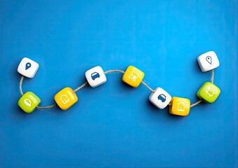 Colorful cube-shaped icons connected by string form a curved path on a vibrant blue surface