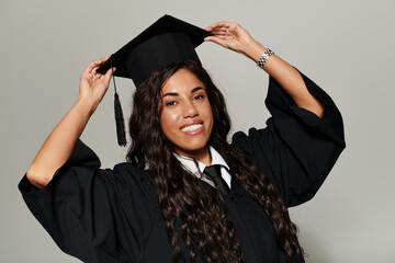 Celebrating graduation with joy and style in a chic academic gown and cap