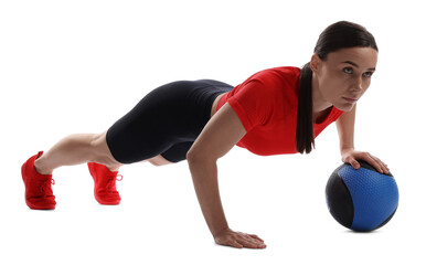 Athletic woman exercising with medicine ball on white background