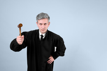 Judge with mallet on grey background. Space for text