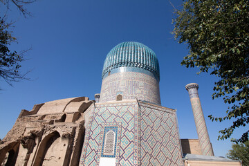 Samarkand , Uzbekistan 20 October, 2024: Guri Amir mausoleum back with minaret
